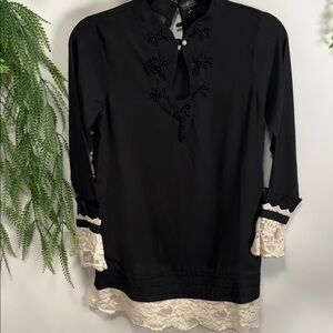 Chic Black Tunic with Lace Accents